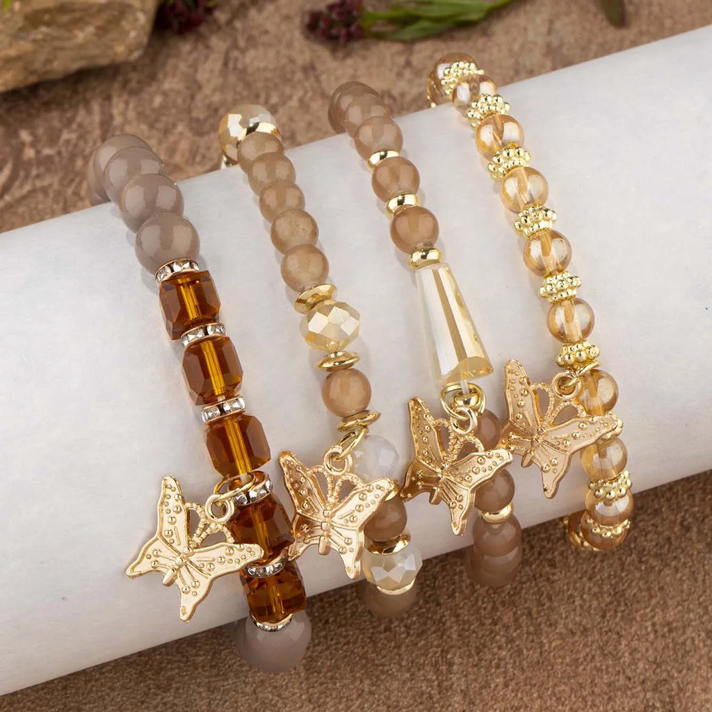 Ensemble de bracelets en perles papillon pour femmes, 4 pièces, tendance, perles acryliques roses, chaîne élastique, bohème, bijoux de fête, cadeau